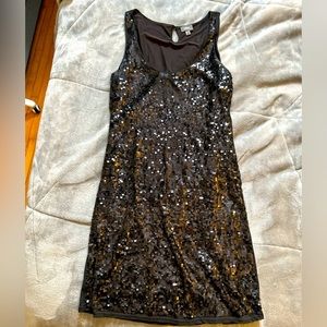 Mexx size Large sequin front dress. Hits mid thigh.